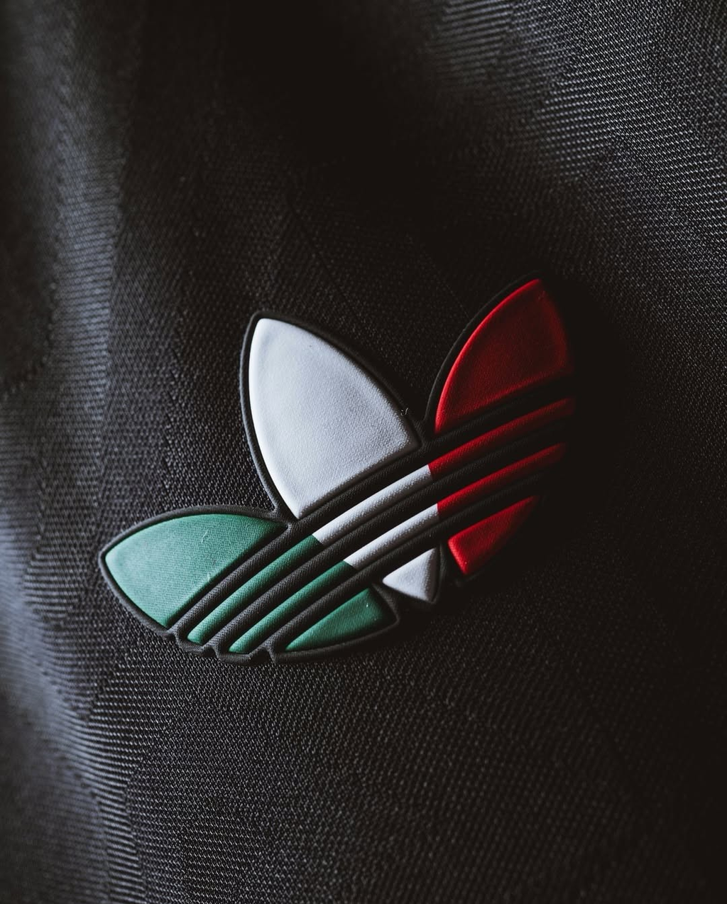 Close-up of the Mexico Third FIFA WC Jersey 2026 crest featuring green, white, and red colors