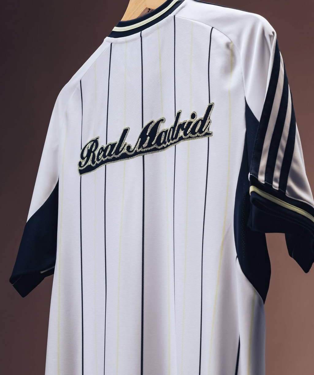 Hoop Store Real Madrid special edition jersey 2025-26 white pinstripe back with navy sleeve stripes and script logo