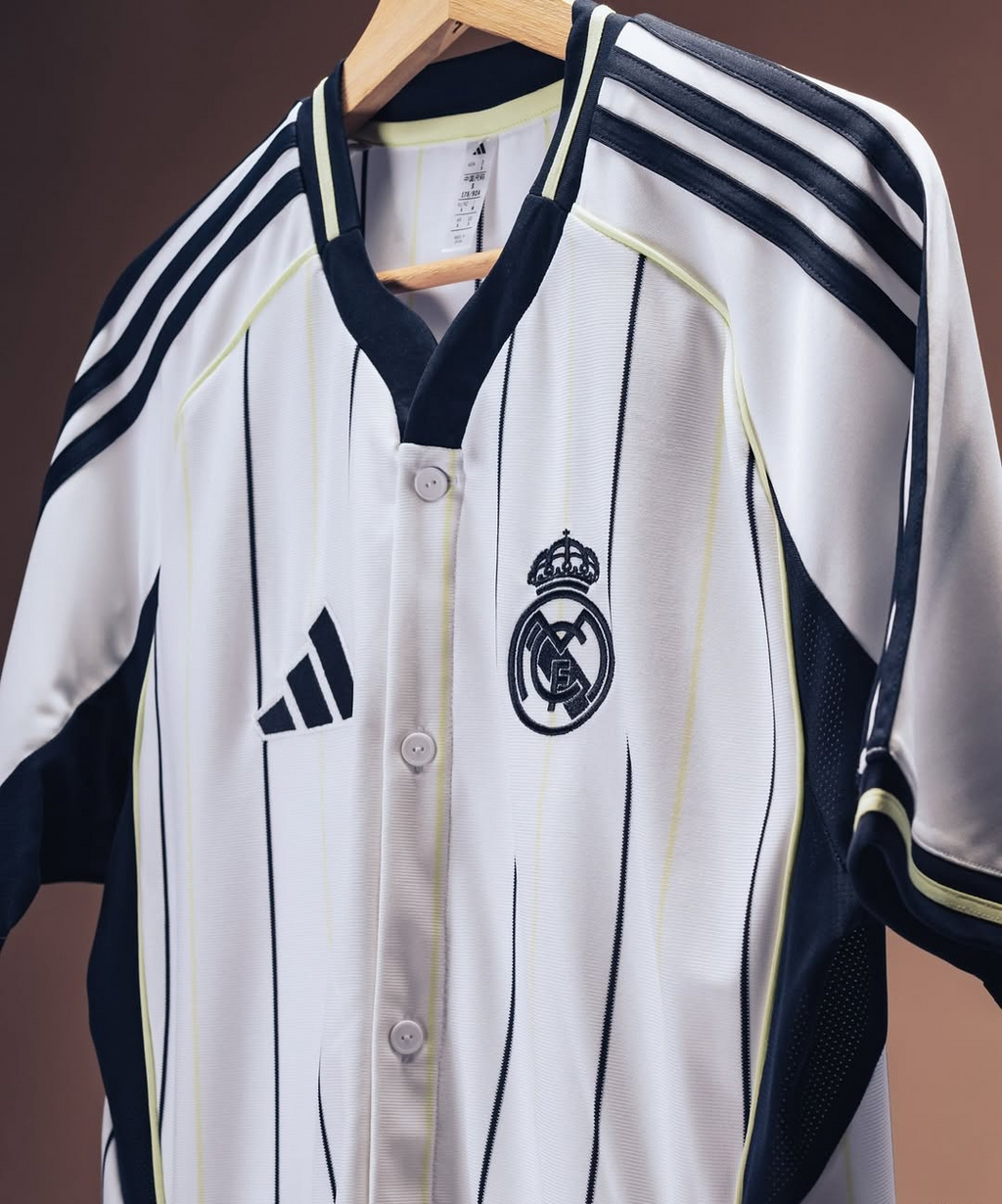 Real Madrid special edition jersey 2025-26 white with thin black pinstripes Adidas style and navy trim