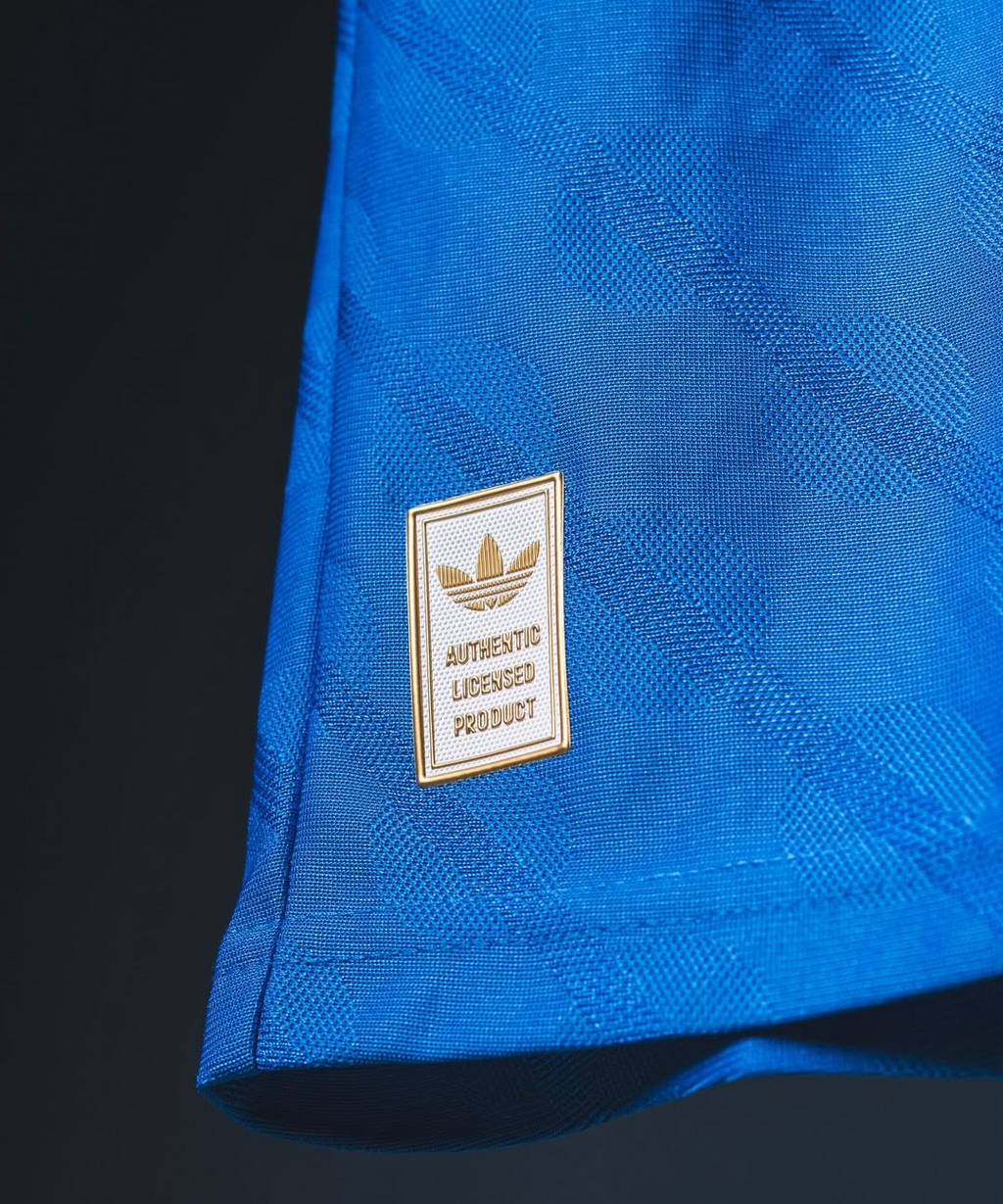 Hoop Store close up of blue Real Madrid Third Jersey 2025-26 hem showing Adidas authentic licensed product patch