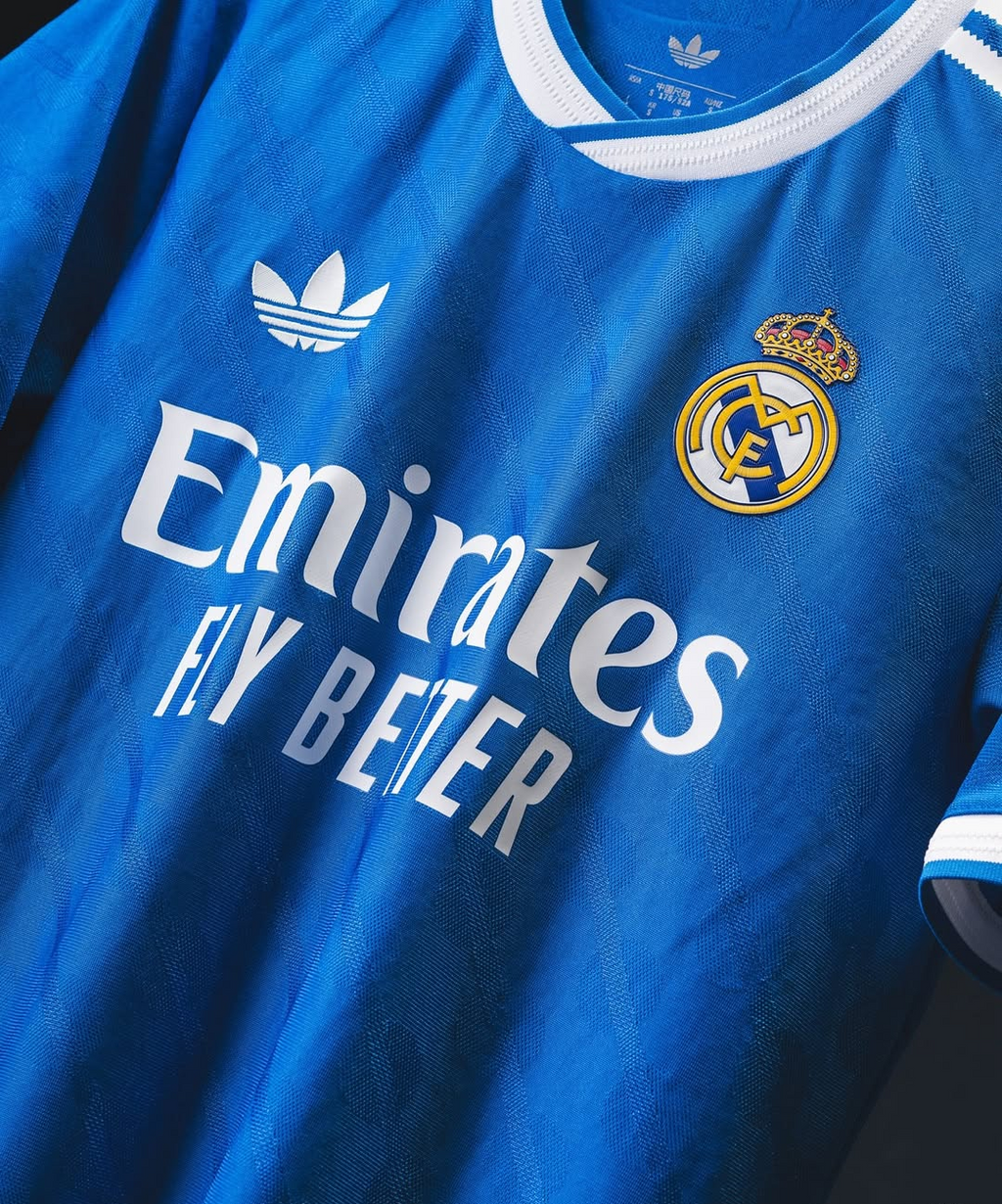 Hoop Store Real Madrid Third Jersey 2025-26 blue Adidas trefoil with Emirates Fly Better sponsor and club crest