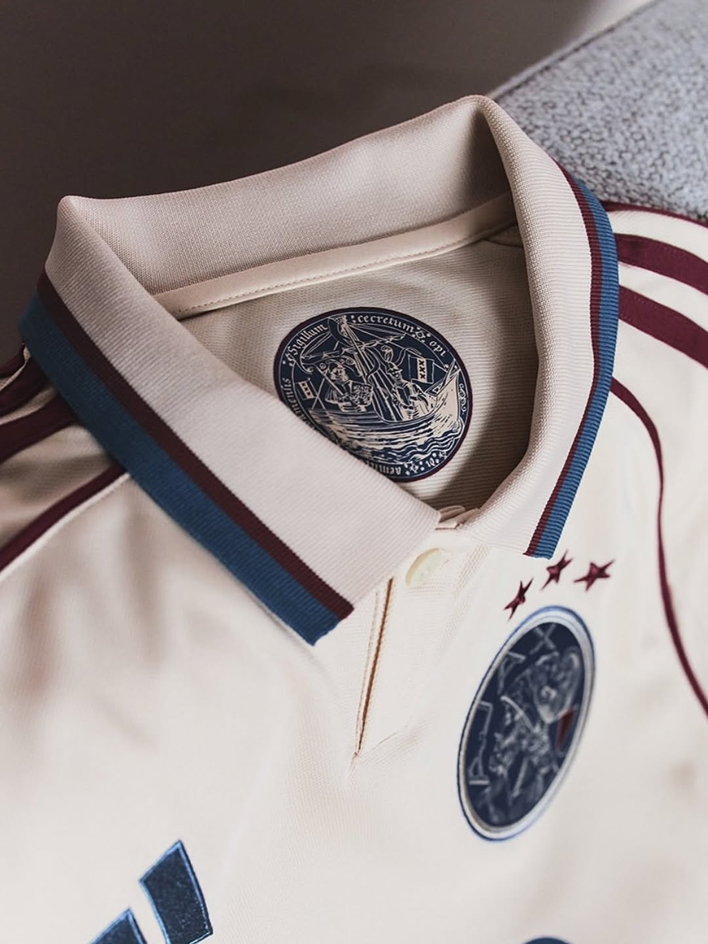 Close-up of Ajax Third Jersey 2025-26 featuring a detailed collar and logo design