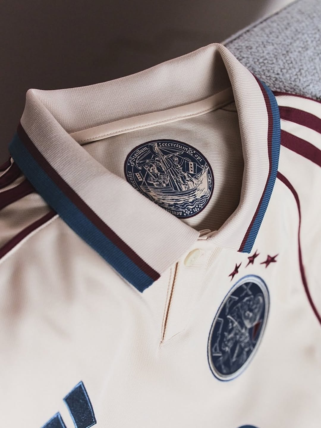 Close-up of Ajax Third Jersey 2025-26 featuring a detailed collar and logo design