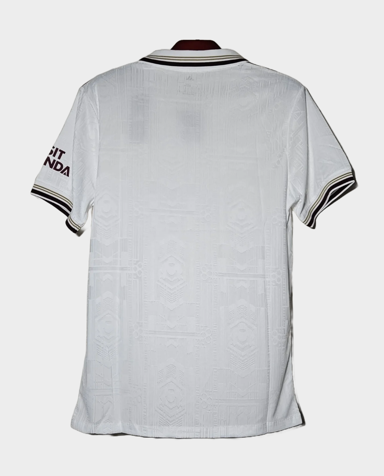 Back view of Arsenal 2025 26 third jersey in white with black and maroon trim from Hoop Store