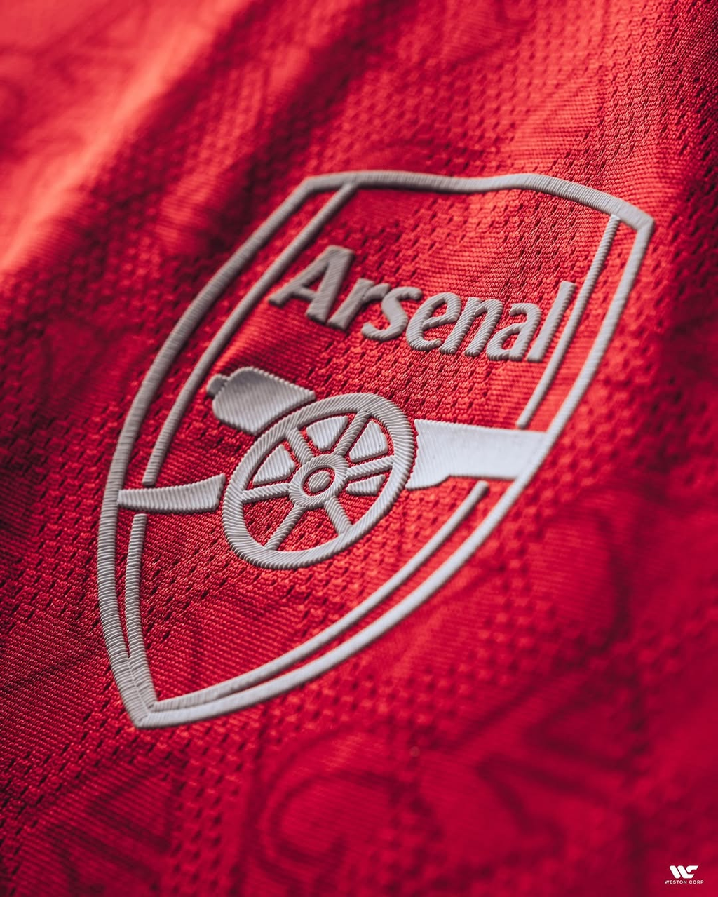 Close-up of the Arsenal home jersey 2025-26 player version featuring the iconic club crest