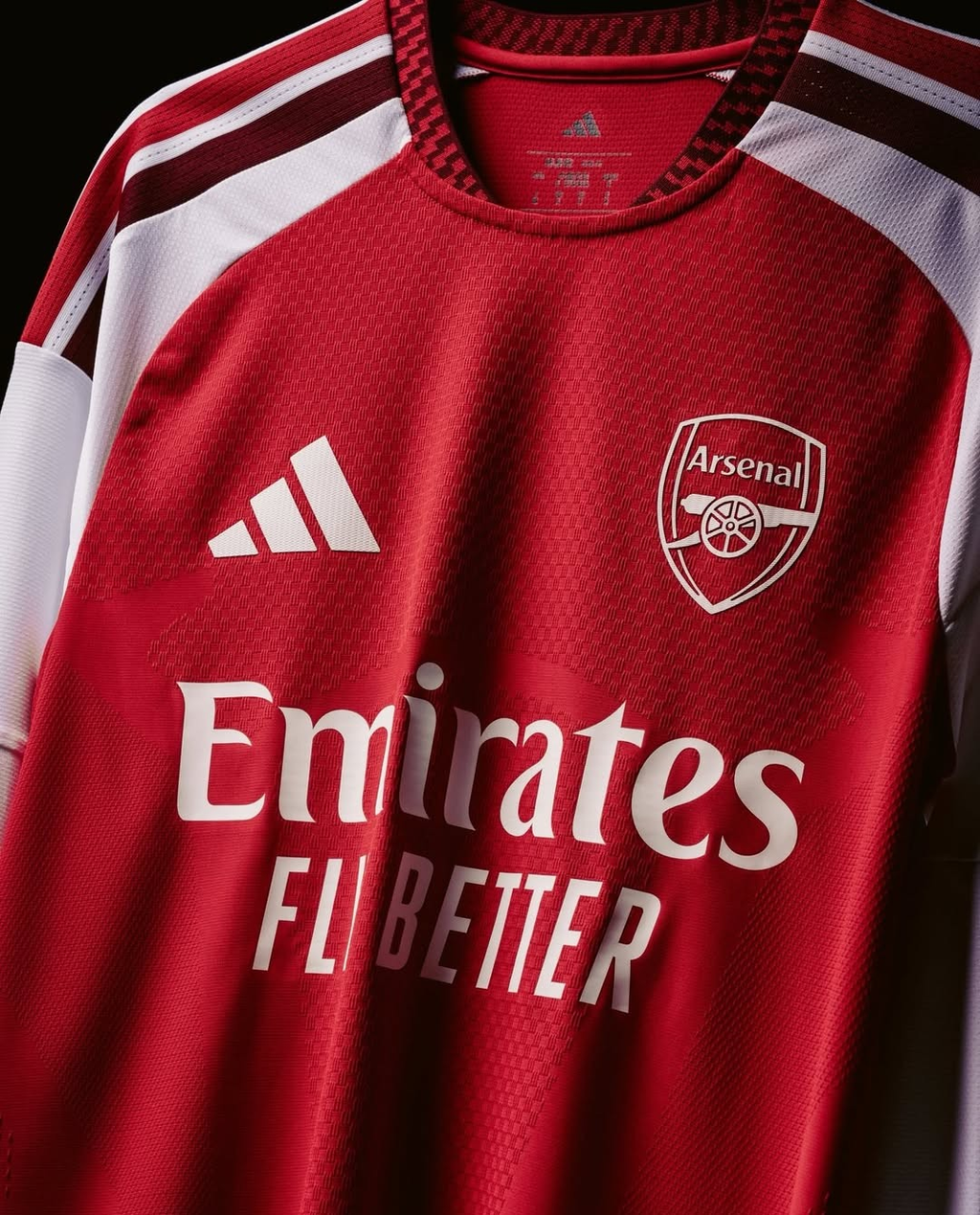 Arsenal Home Jersey 2026-27 featuring red and white design with Emirates logo