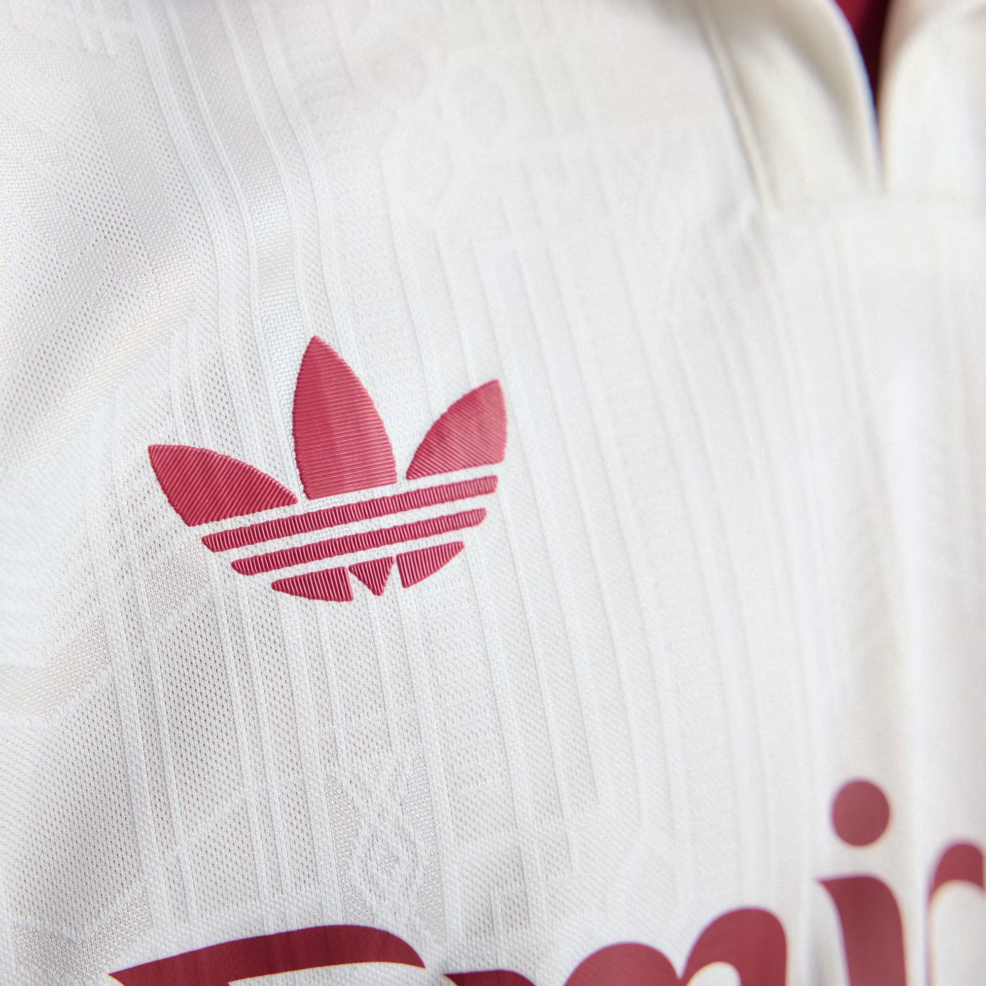 Close-up of Adidas logo on the Arsenal third jersey 2025-26 player version, showcasing intricate fabric details