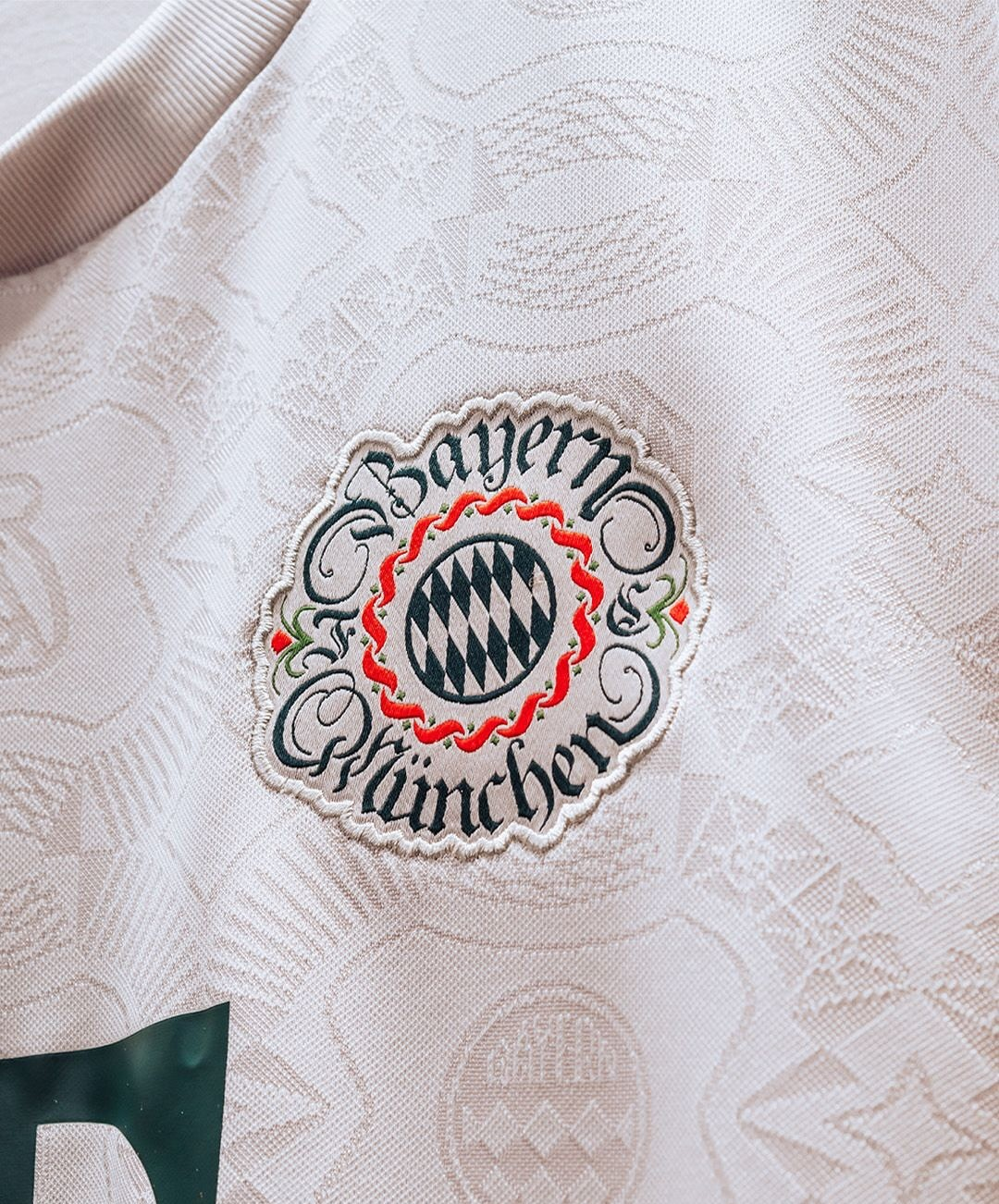 Bayern Munich Oktoberfest jersey 2025-26 featuring the iconic logo stitched on a light fabric
