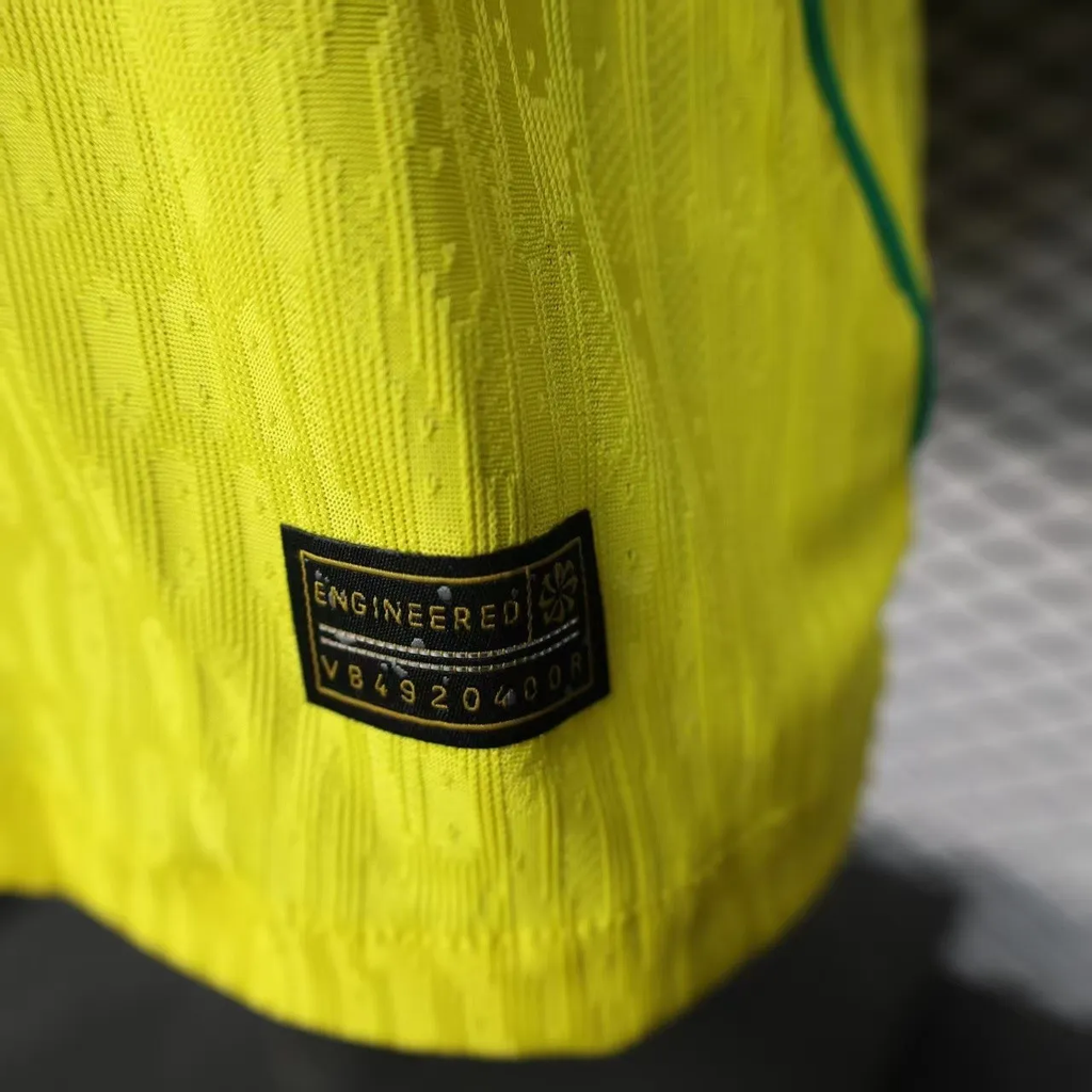Close-up of the Brazil 2026 FIFA World Cup jersey with engineered tag in vibrant yellow fabric