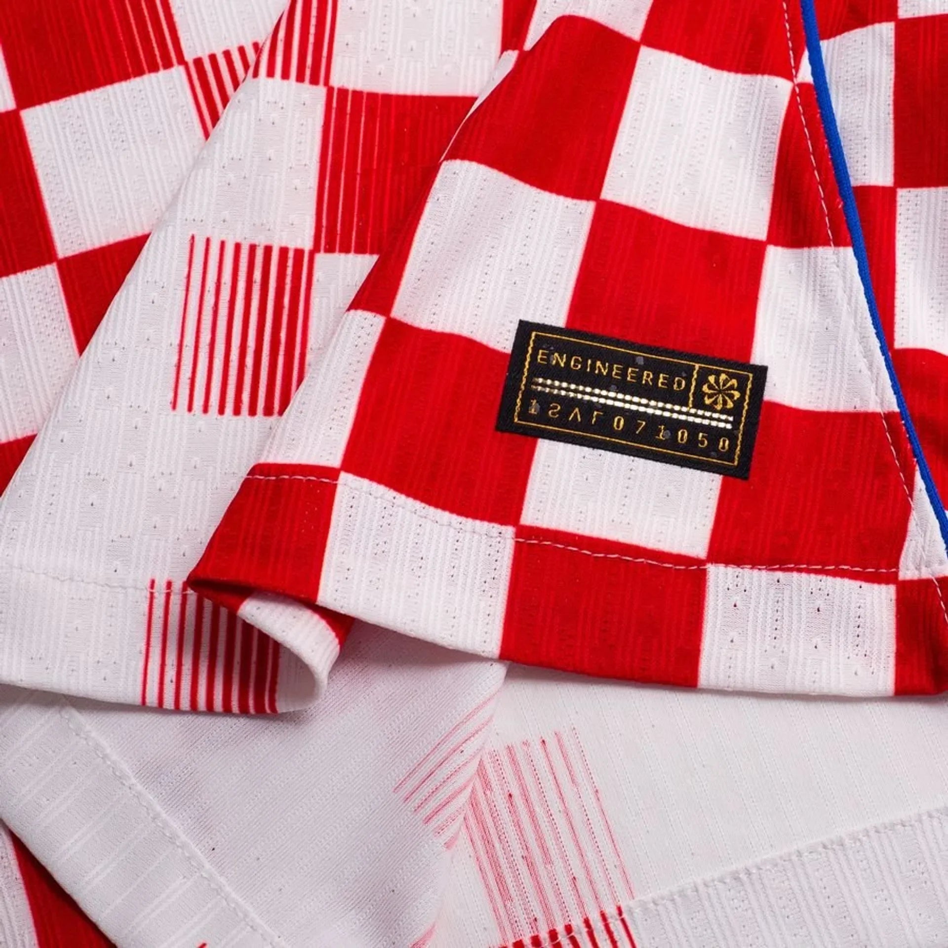 Croatia Home FIFA WC Jersey 2026 Fan Version featuring a red and white checkered design with engineered label