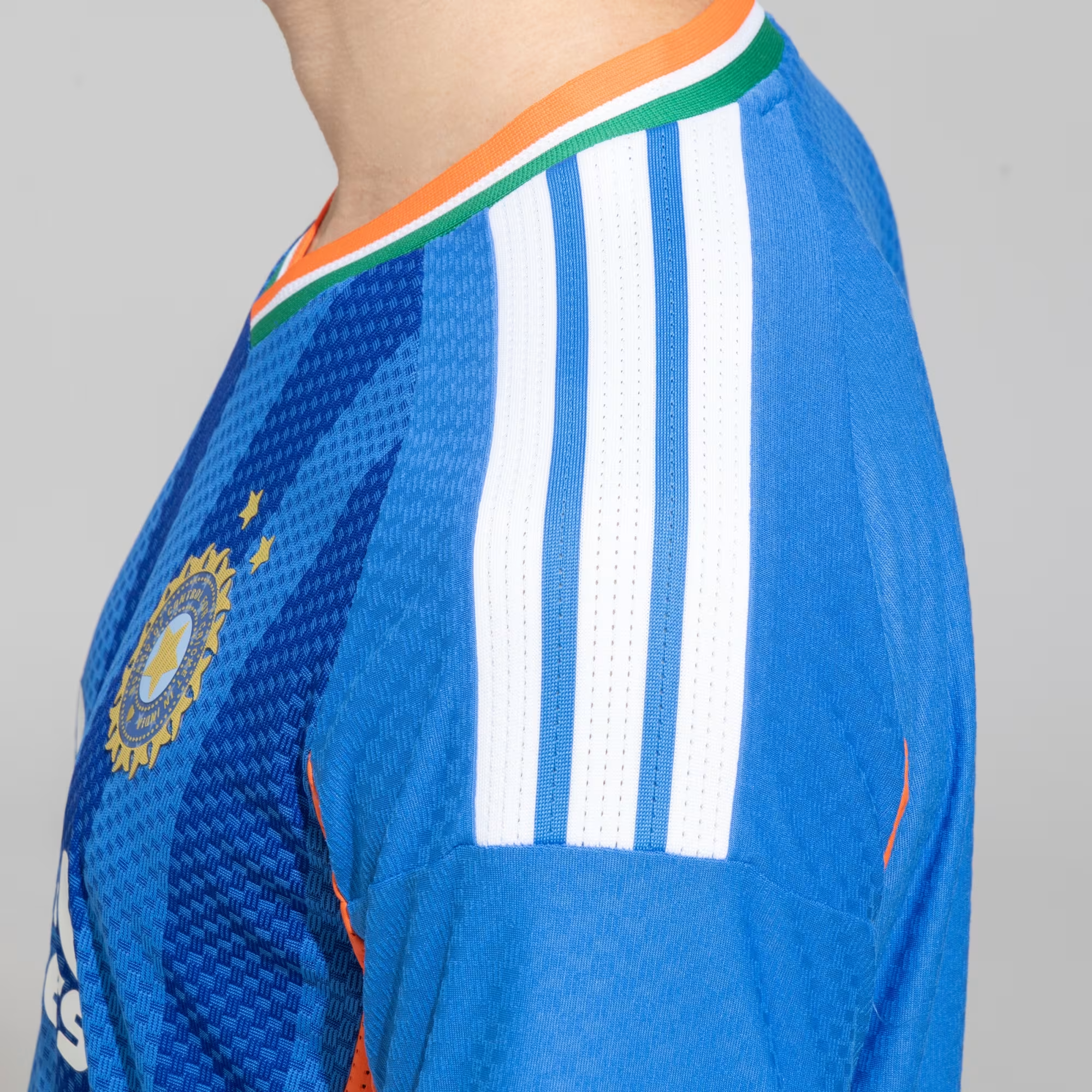 Side view of Hoop Store India T20 World Cup jersey 2026 with vibrant blue and tri-color accents