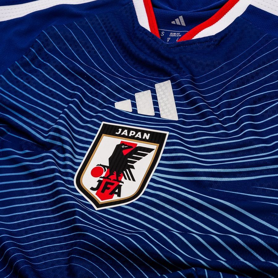 Japan Home FIFA WC Jersey 2026 featuring the Japan Football Association emblem and striped design