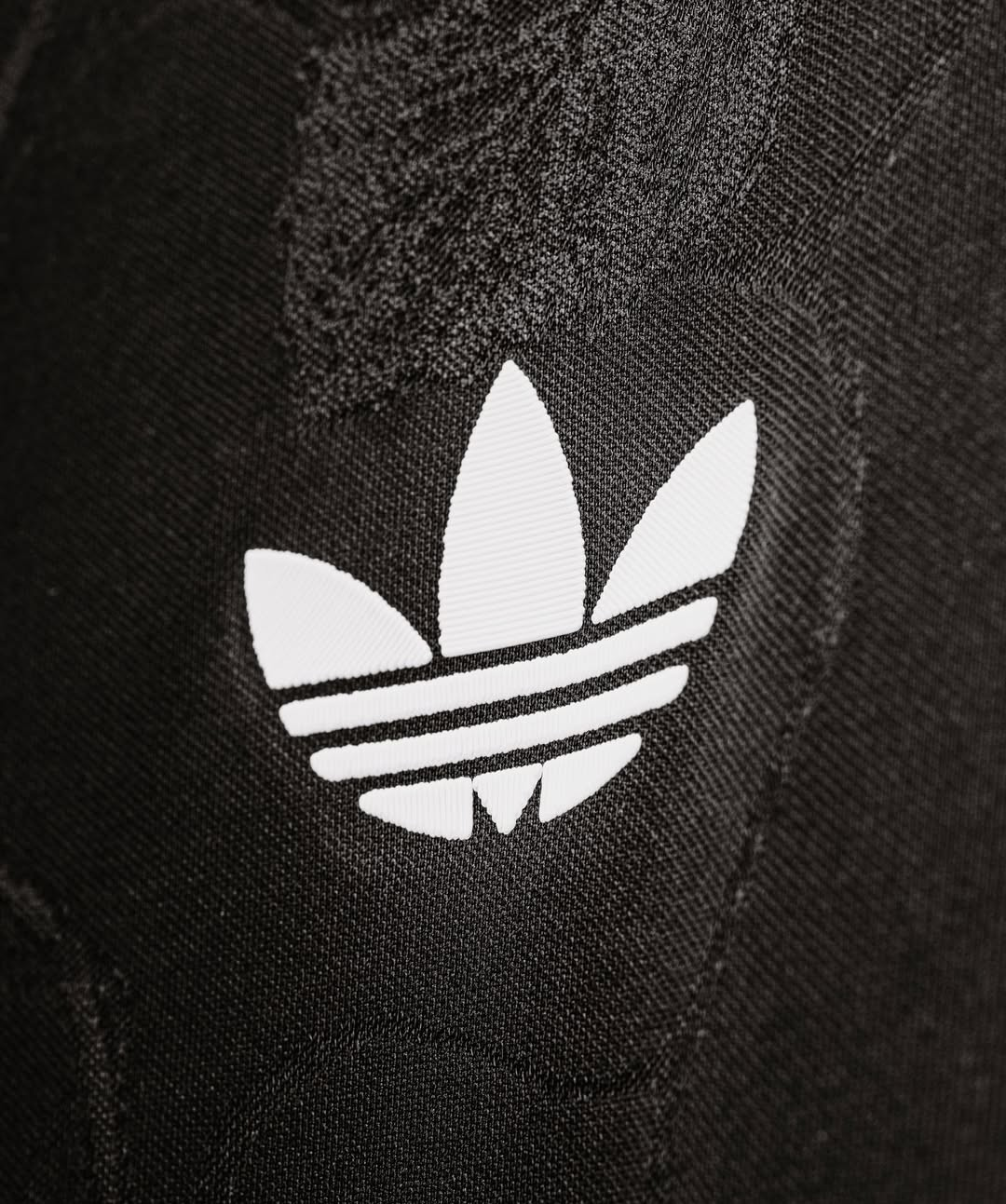Close-up of the Hoop Store Juventus 25-26 third jersey featuring Adidas logo detail
