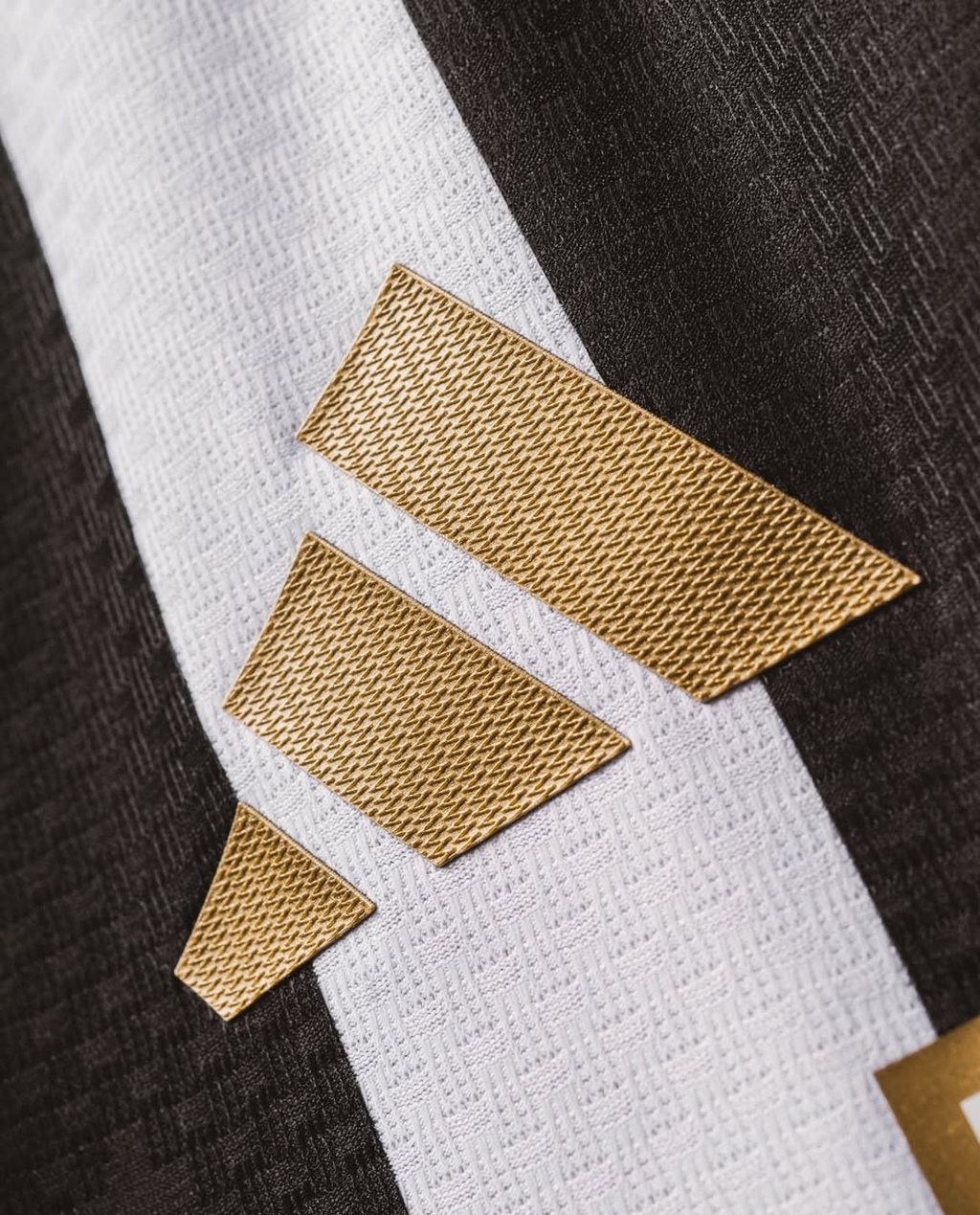 Close-up of Juventus Home Jersey 2026-27 detailing with textured black and white fabric