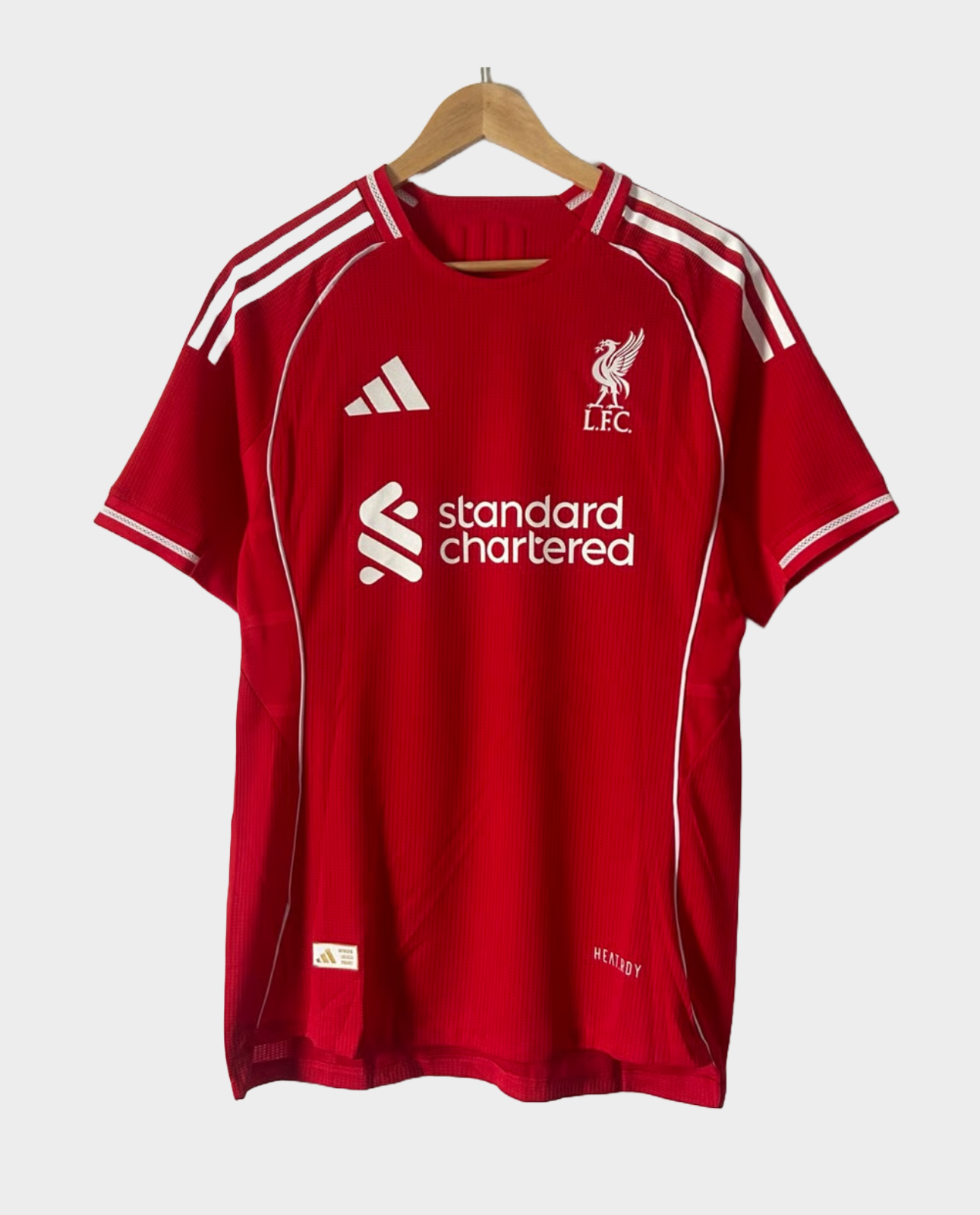 Liverpool 2025-26 home jersey player version in red with club logo and sponsor branding
