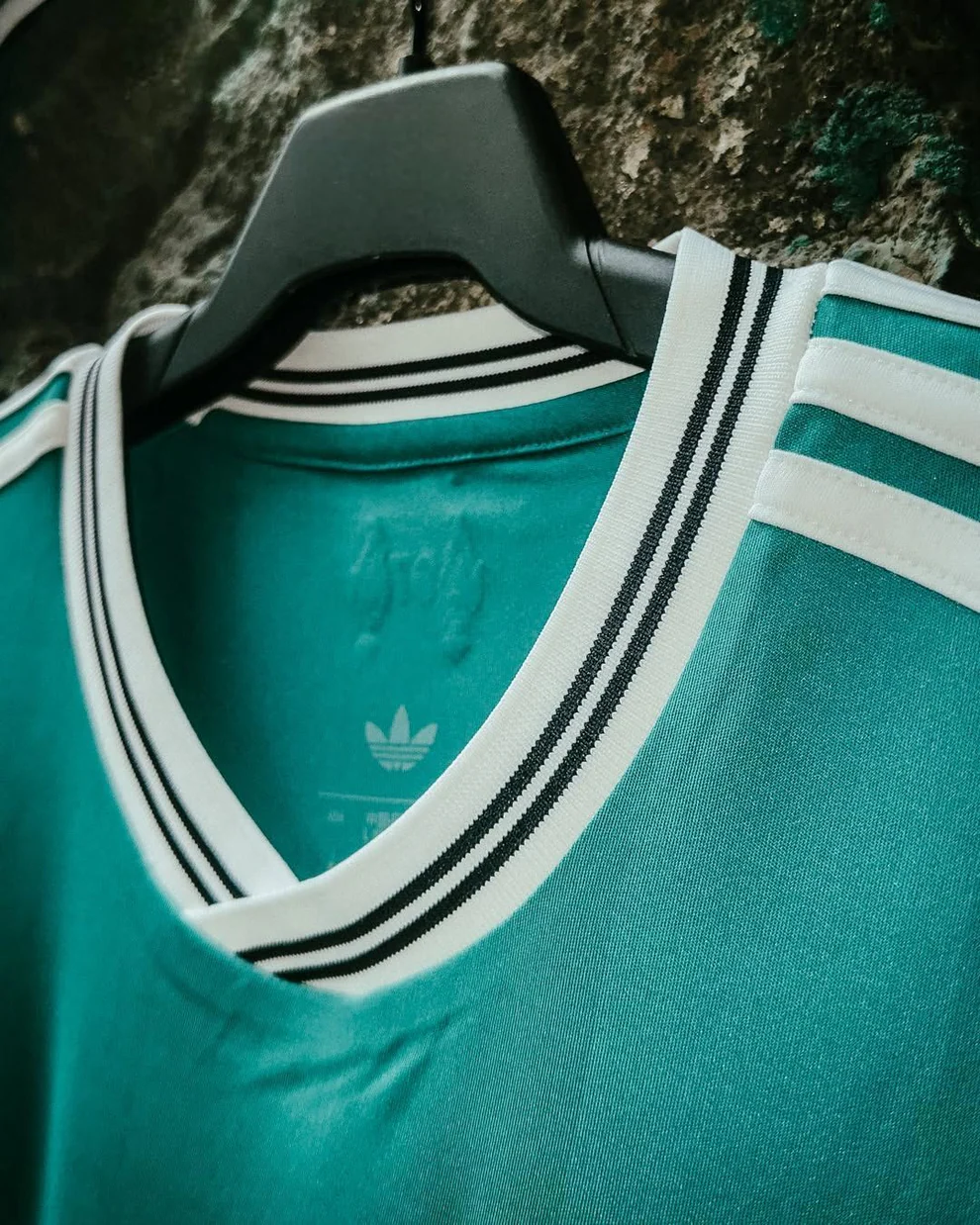 Close-up of the Liverpool third jersey 2025-26 player version featuring unique collar design and vibrant color