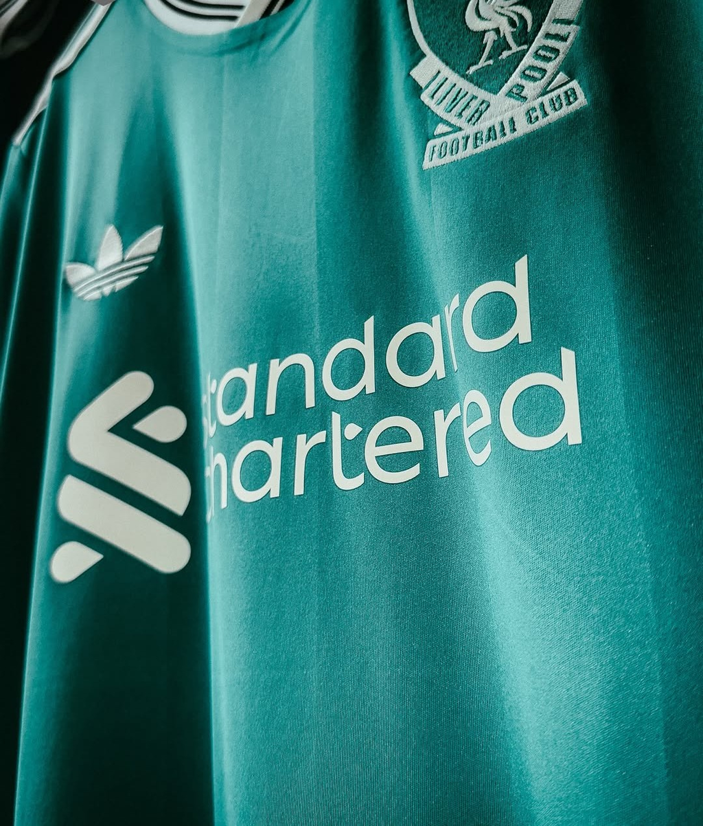 Liverpool third jersey 2025-26 player version in teal with Standard Chartered logo and Adidas branding