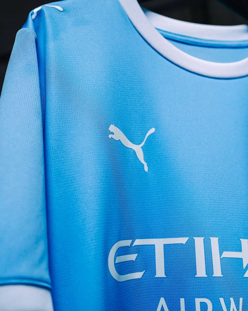 Close-up of Manchester City Home Jersey 2026-27 Fan Version featuring Puma logo and light blue design