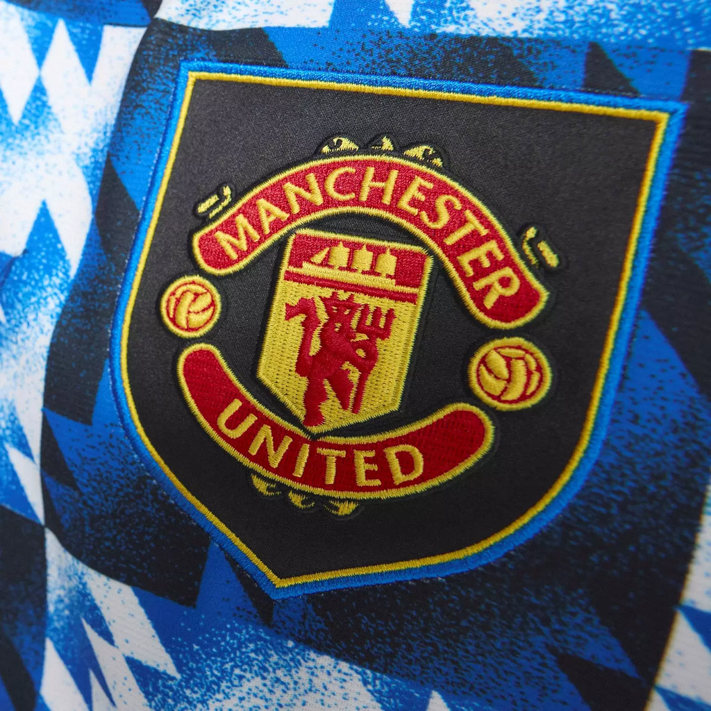 Manchester United LFSTLR special edition jersey featuring embroidered team crest and vibrant design
