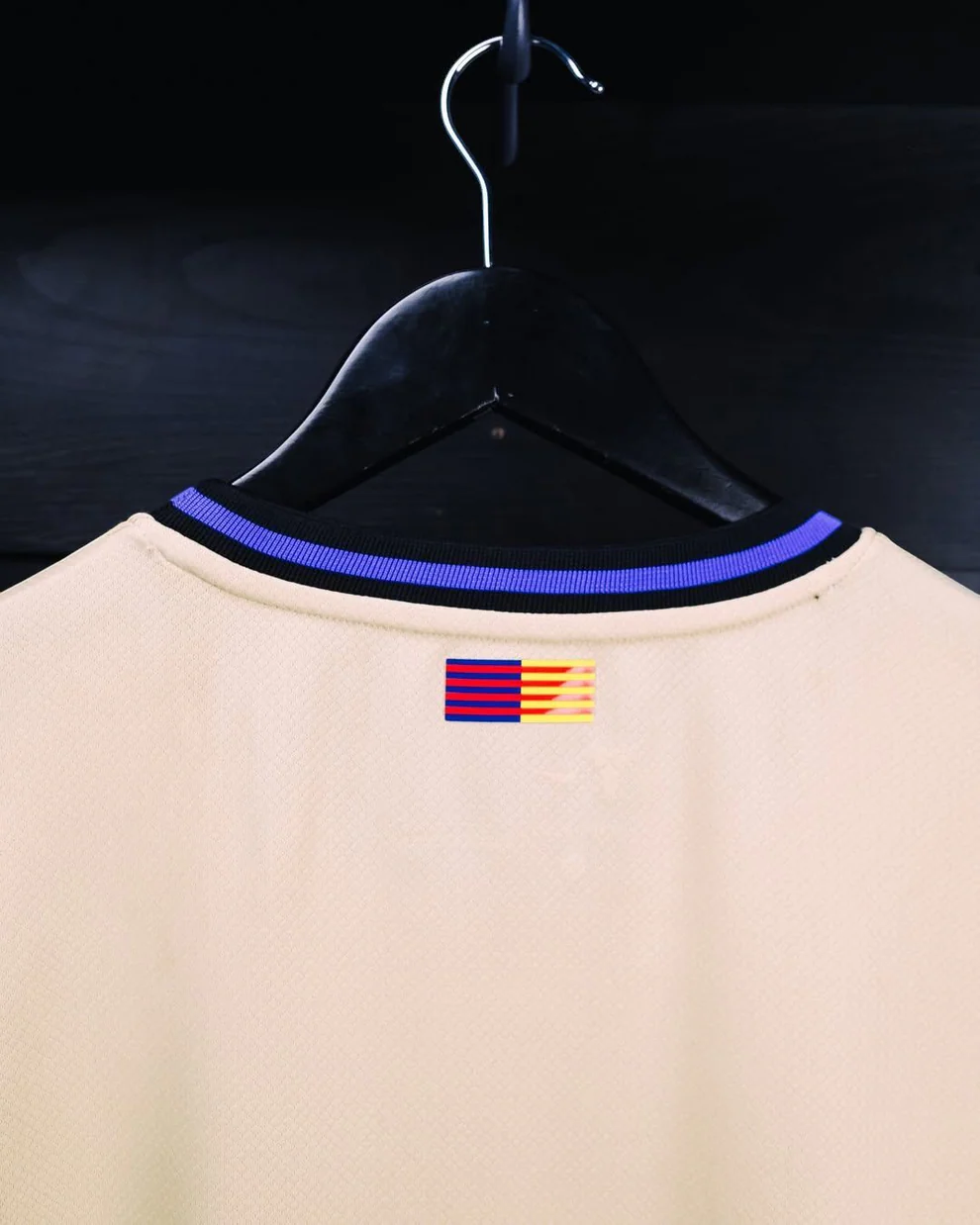 Hoop Store Barcelona away jersey 2025-26 beige back view with purple trimmed collar and rear flag detail