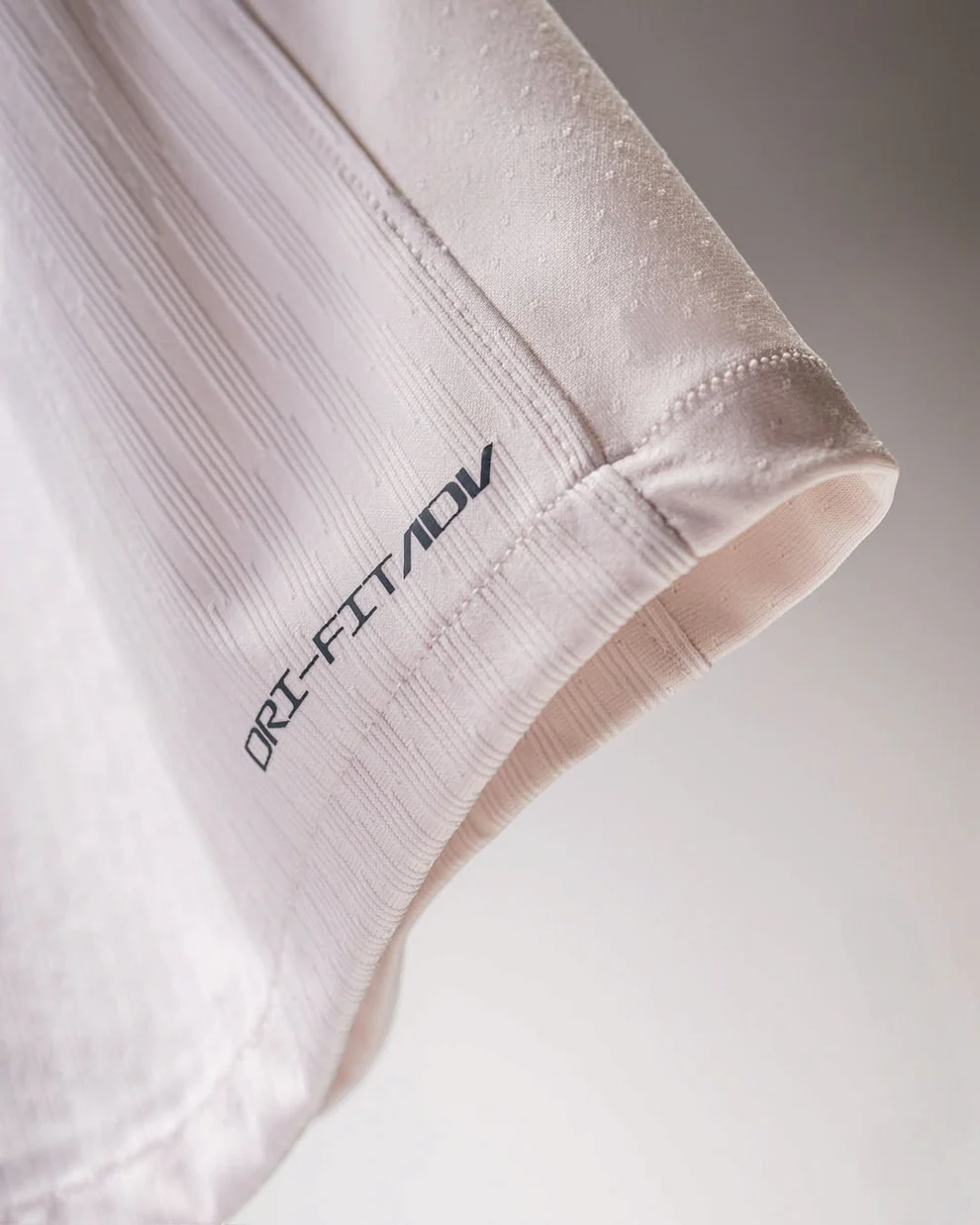 Close-up detail of sleeve showing Dri-FIT ADV fabric on Chelsea away jersey 2025-26 from Hoop Store