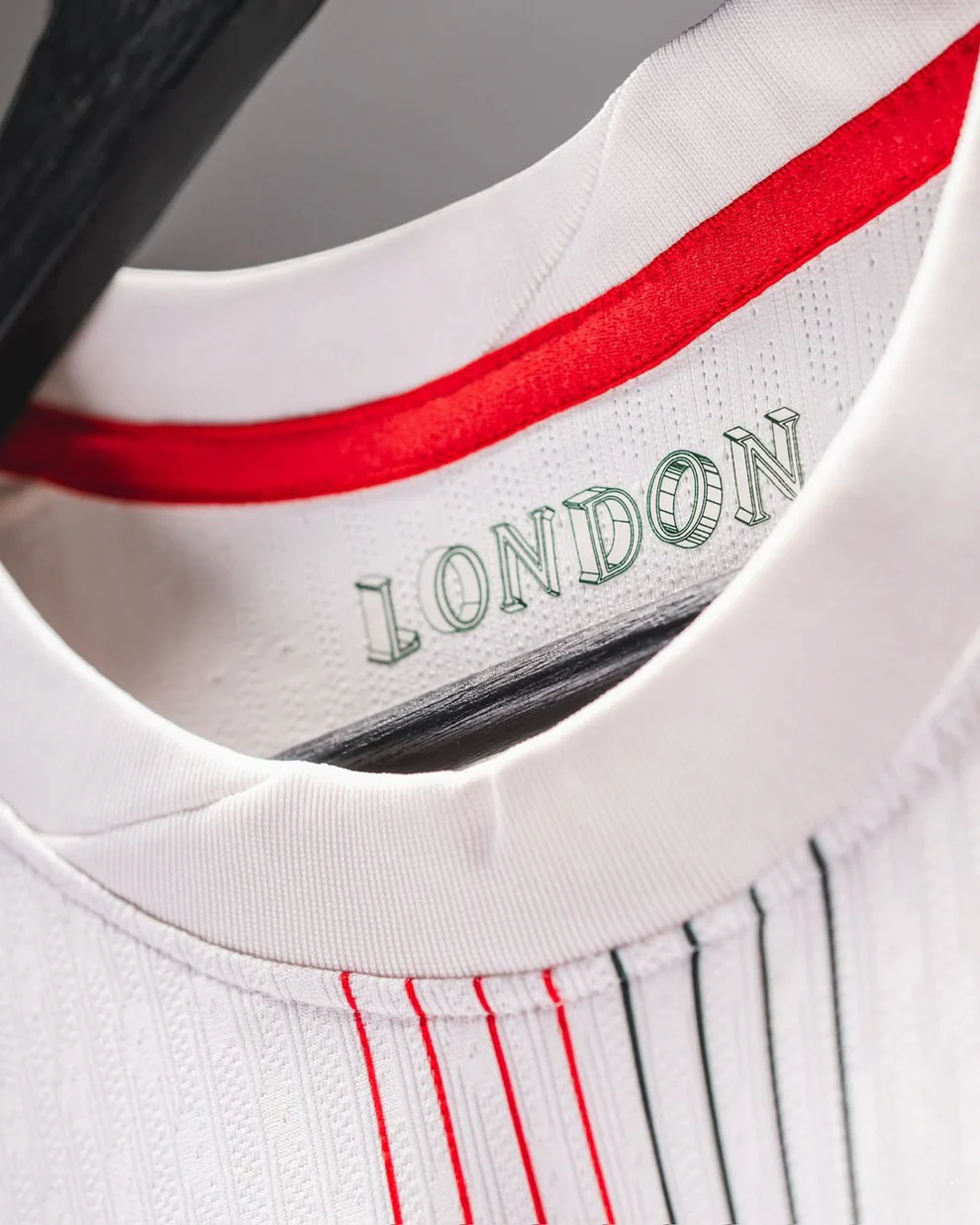 Close-up of Hoop Store Chelsea away jersey 2025-26 collar with London text and red trim