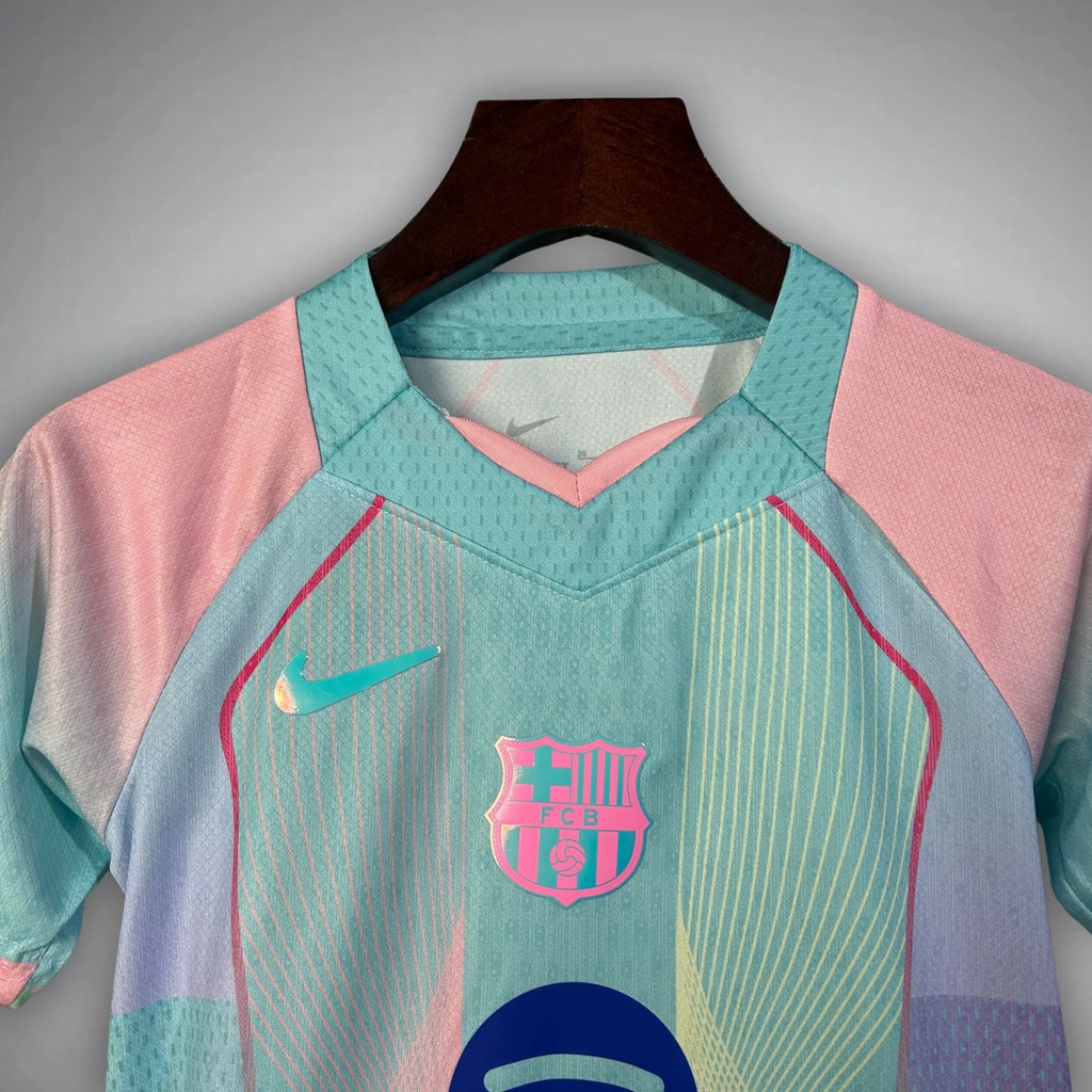 Hoop Store FC Barcelona Blue Edition Jersey 2025-26 pastel aqua and pink Nike crest front view on hanger