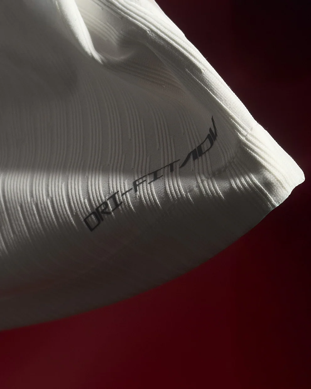 Hoop Store close up of Tottenham Hotspur 2025 home jersey white textured sleeve with Dri FIT fabric