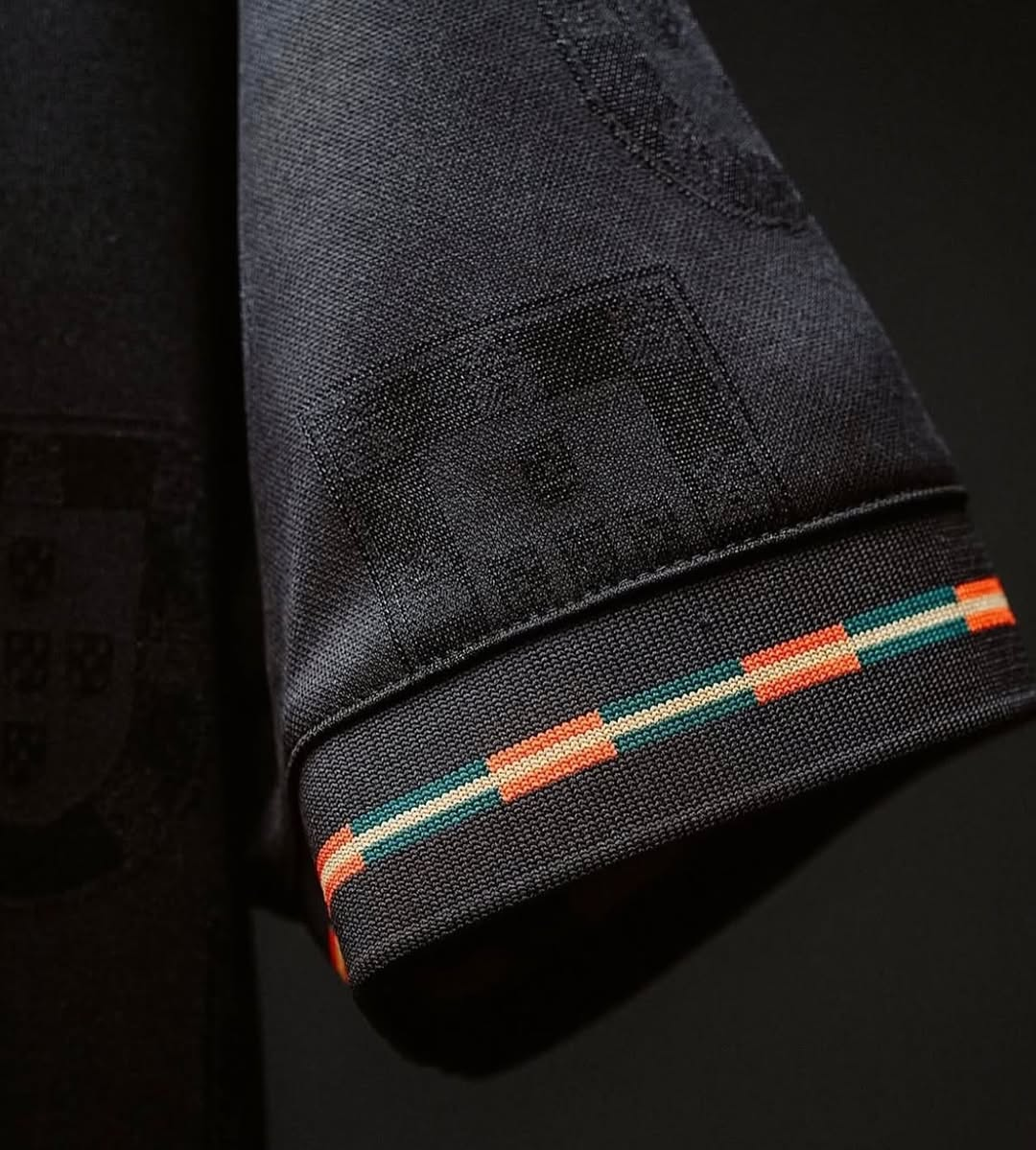 Close-up of Portugal Pantera Negra Ronaldo jersey 2026 sleeve with detailed design and vibrant colors