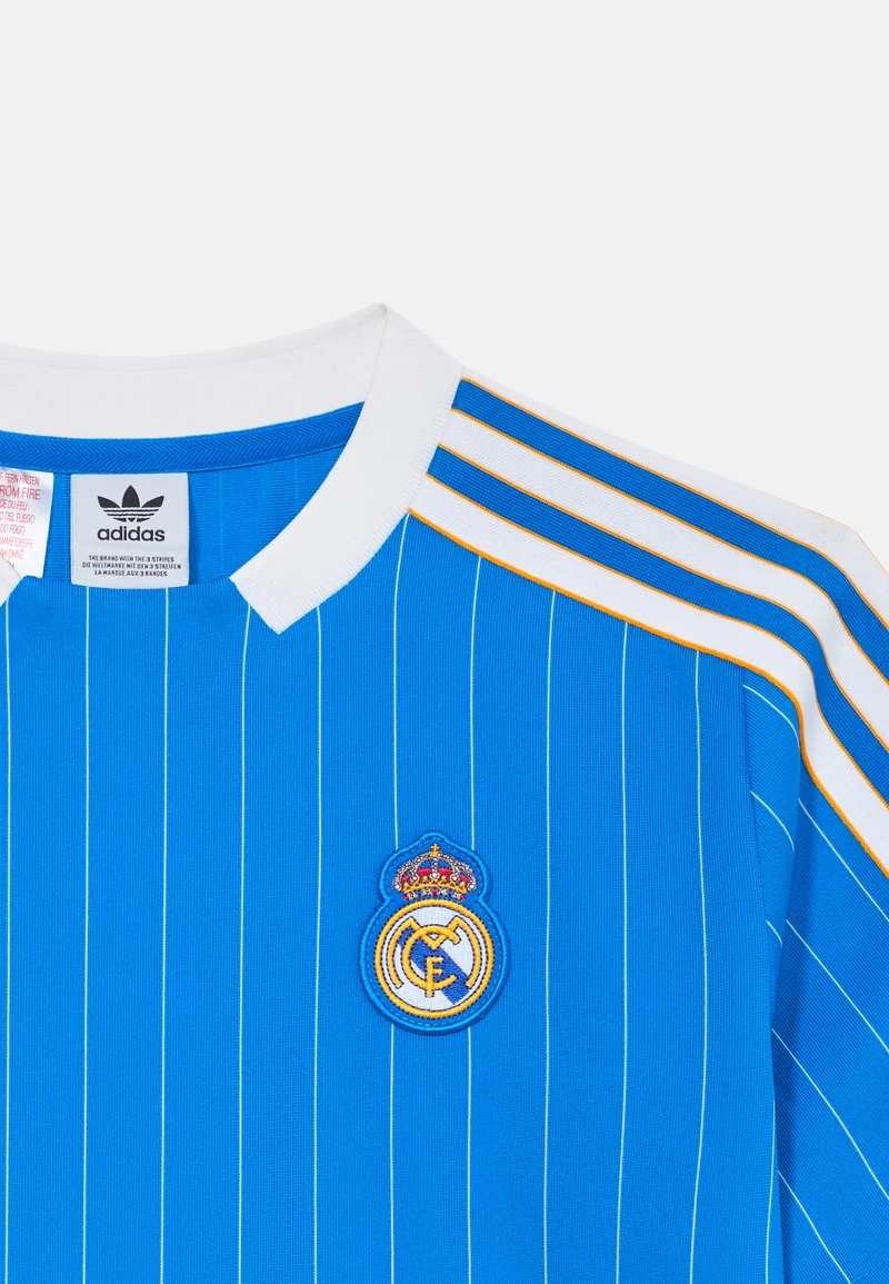 Hoop Store Real Madrid terrace icon player version jersey with blue stripes and logo