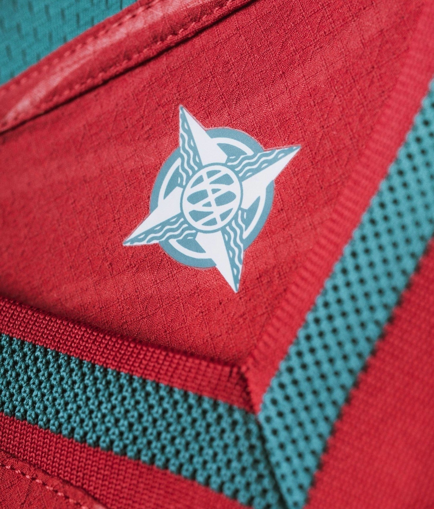 Detail of the collar on the Ronaldo Portugal 2026 FIFA home jersey featuring a unique badge design
