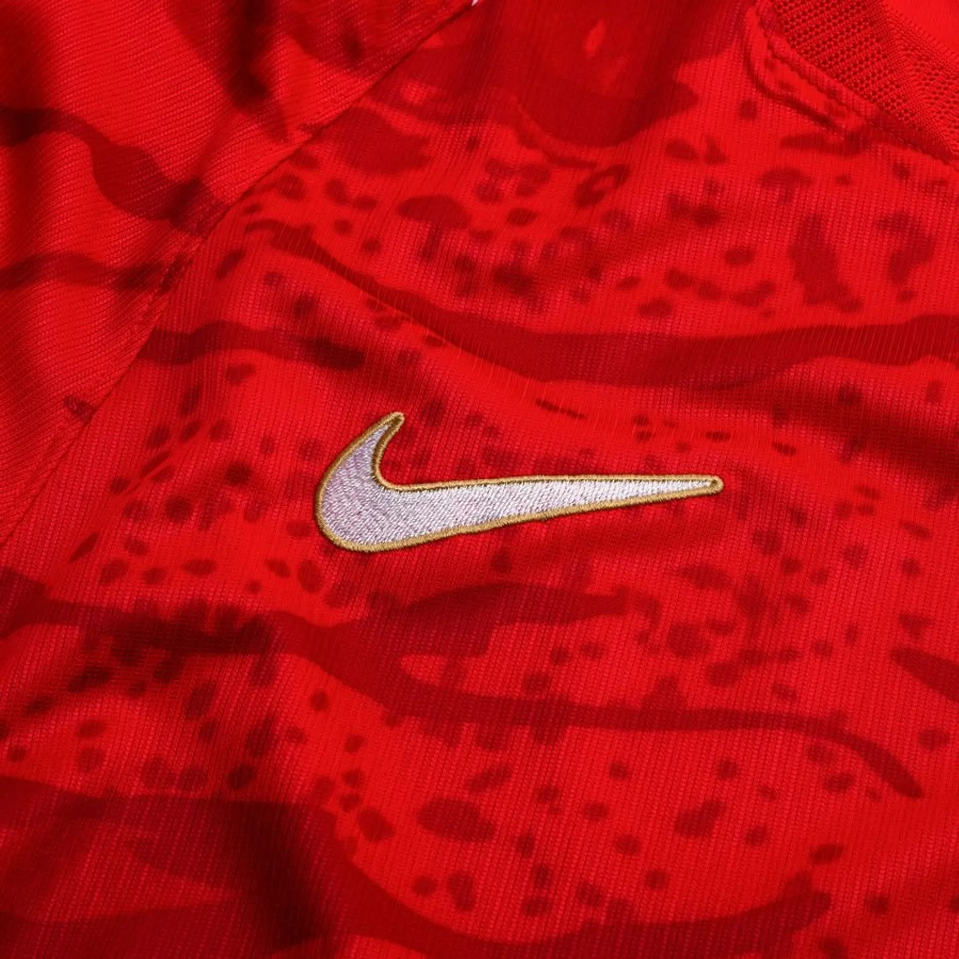 Close-up of the Nike logo on the South Korea Home FIFA World Cup Jersey 2026 in vibrant red
