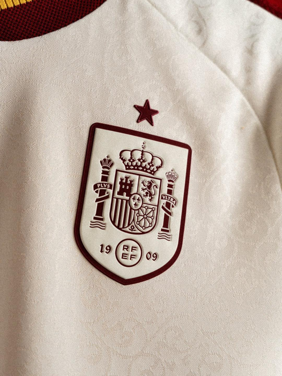 Close-up of the crest on the Spain Away FIFA World Cup Jersey 2026 featuring intricate detailing